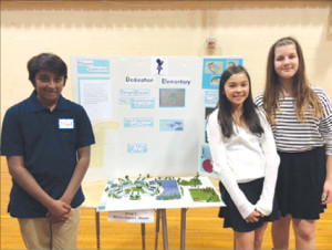 Bullis Charter School alumni, from left, Ninnad Raman, Maddie Young and Sophia Lufkin received “Highest Excellence” on their SchoolsNEXT project, which was a design for a school of the future. 